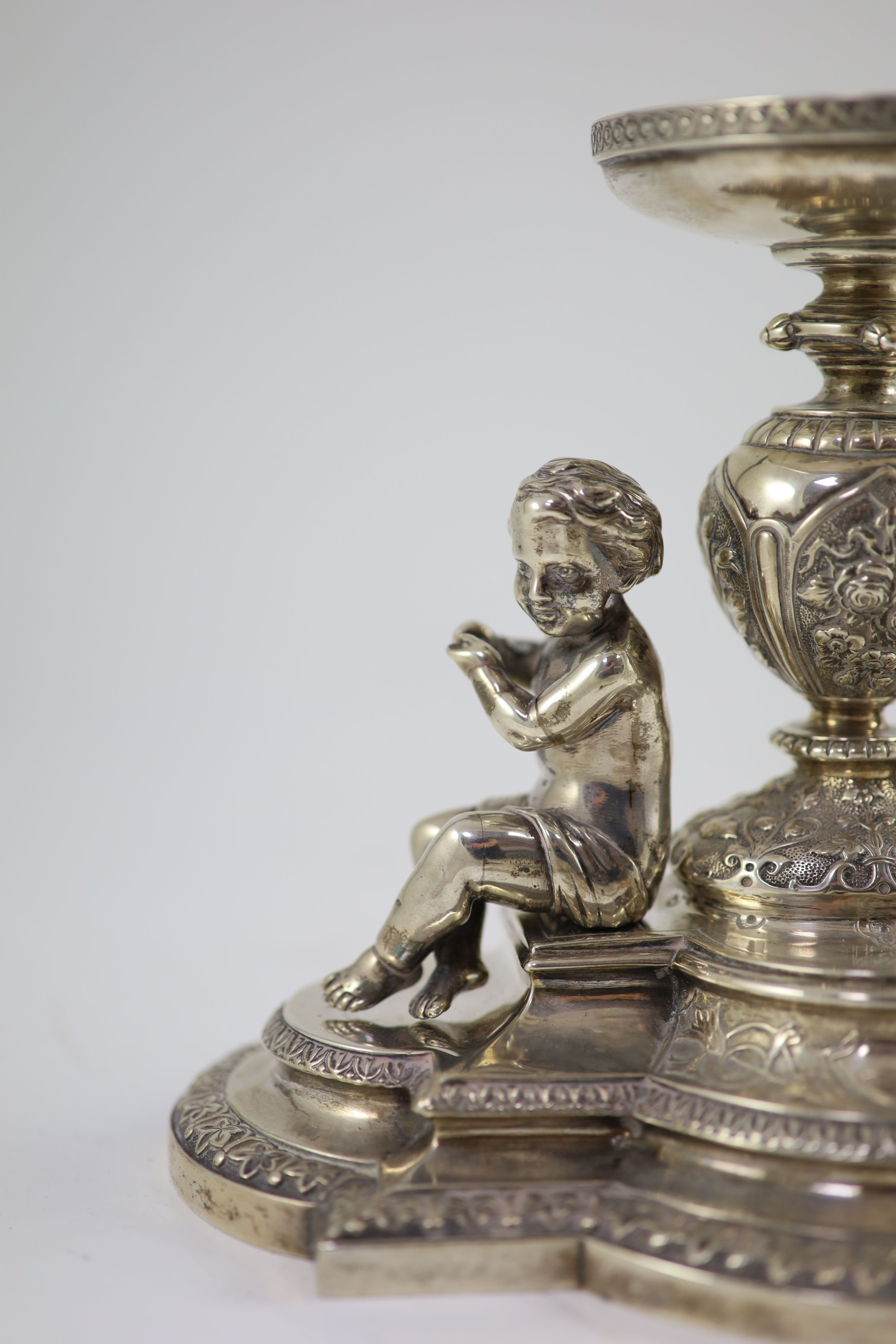 A Victorian silver centrepiece (lacking trumpet)